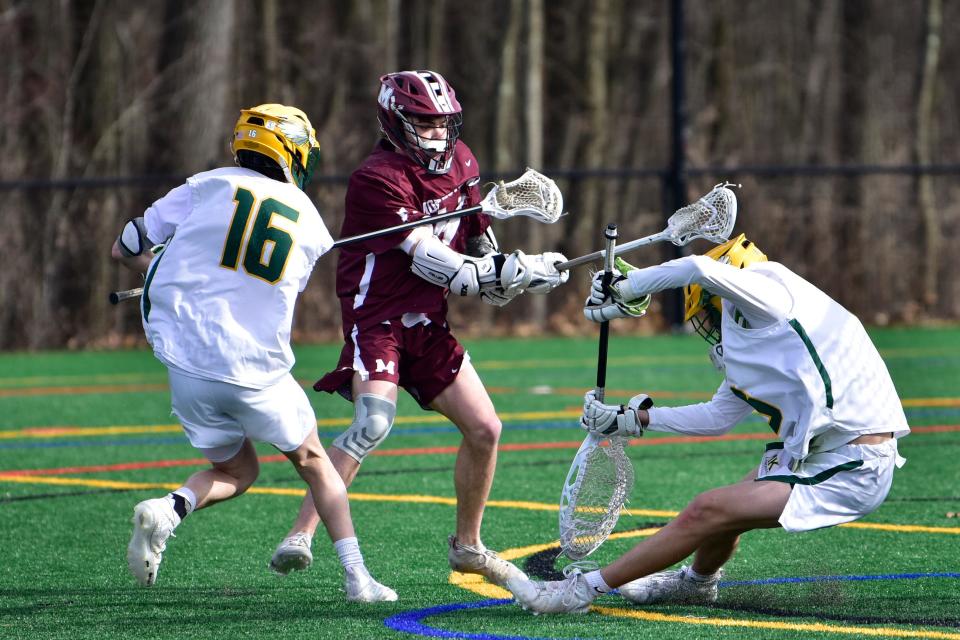 Colin O'Connor, #14 of Morristown scores a goal to tie the Rizk boys lacrosse game against Morris Knolls, 1-1, in the second half at Morris Knolls High in Denville, Monday on 04/11/22.