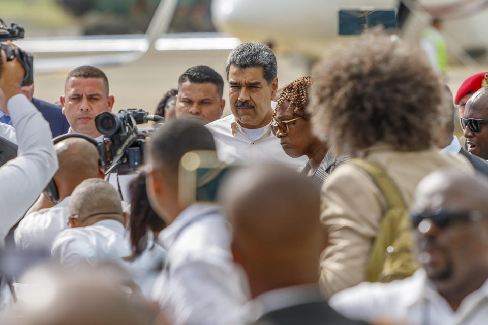 Venezuela's President Nicolas Maduro, top center, arrives to the Argyle International Airport in Argyle, St. Vincent, Thursday, Dec. 14, 2023. Maduro arrived for a meeting with Guyana's President Irfaan Ali over a long-standing dispute over the Essequibo territory, a vast border region rich in oil and minerals that represents much of Guyana's territory but that Venezuela claims as its own. (AP Photo/Lucanus D. Ollivierre)