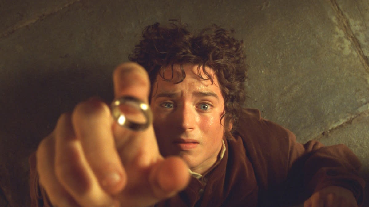  Frodo grabs hold of the One Ring in Lord of the Rings. 