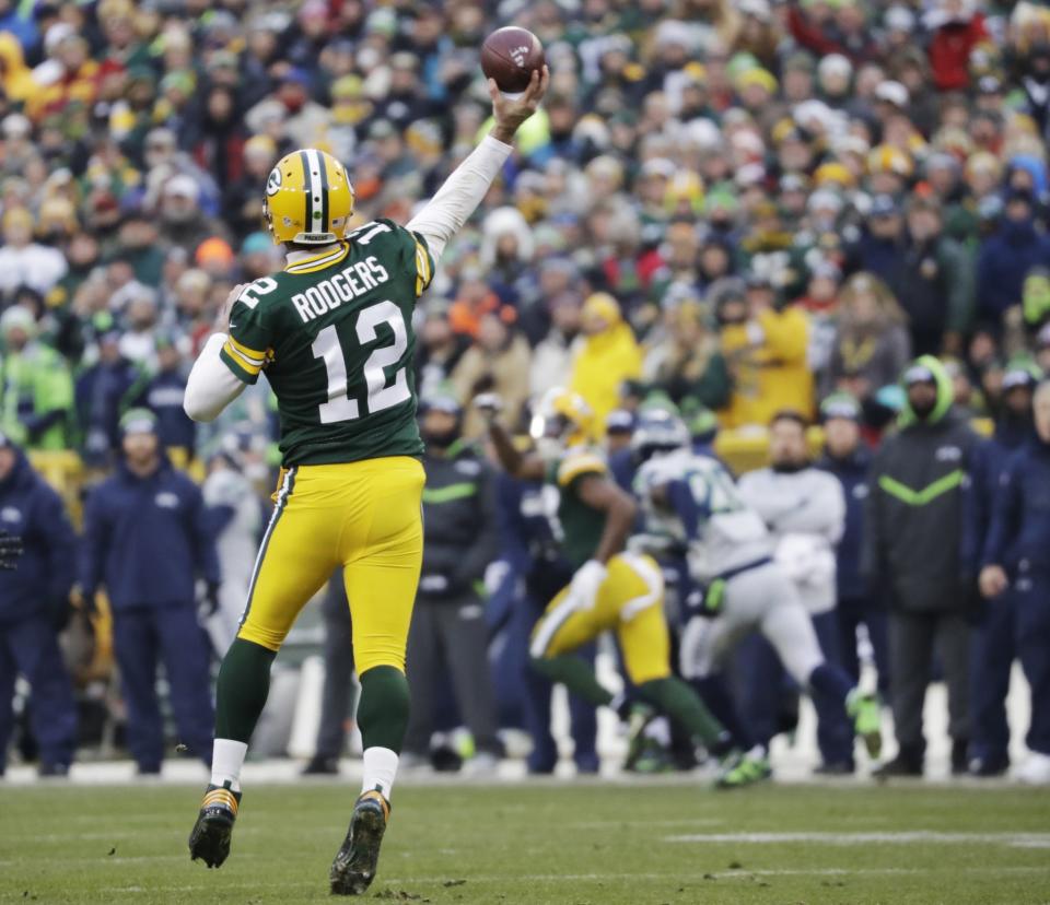 Aaron Rodgers clearly was hobbled against the Seattle Seahawks but was terrific in the Packers' victory. (AP)