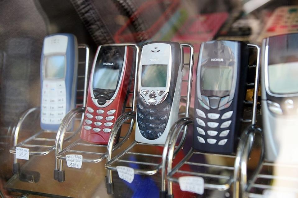 Cell phones from the early 2000s on display