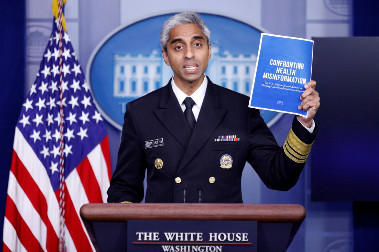 United States Surgeon General Vivek Murthy delivers remarks during a news conference with White House Press Secretary Jen Psaki at the White House in Washington, U.S., July 15, 2021. REUTERS/Tom Brenner