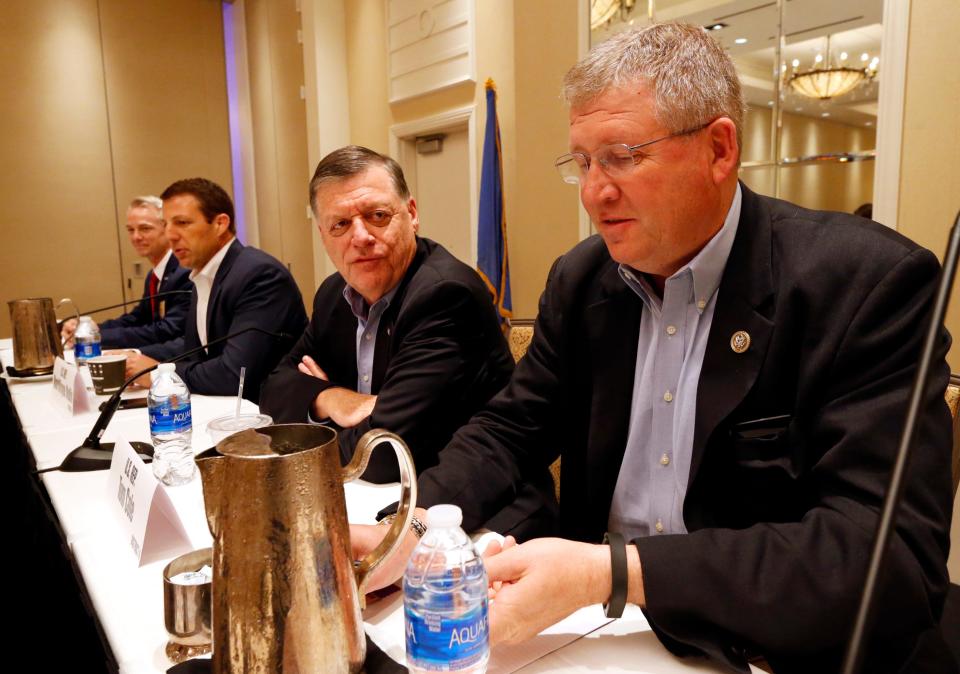 U.S. Rep. Frank Lucas, right, and U.S. Rep. Tom Cole are pictured June 10, 2017, during a panel discussion at the Oklahoma Press Association's 2017 Convention in Oklahoma City.