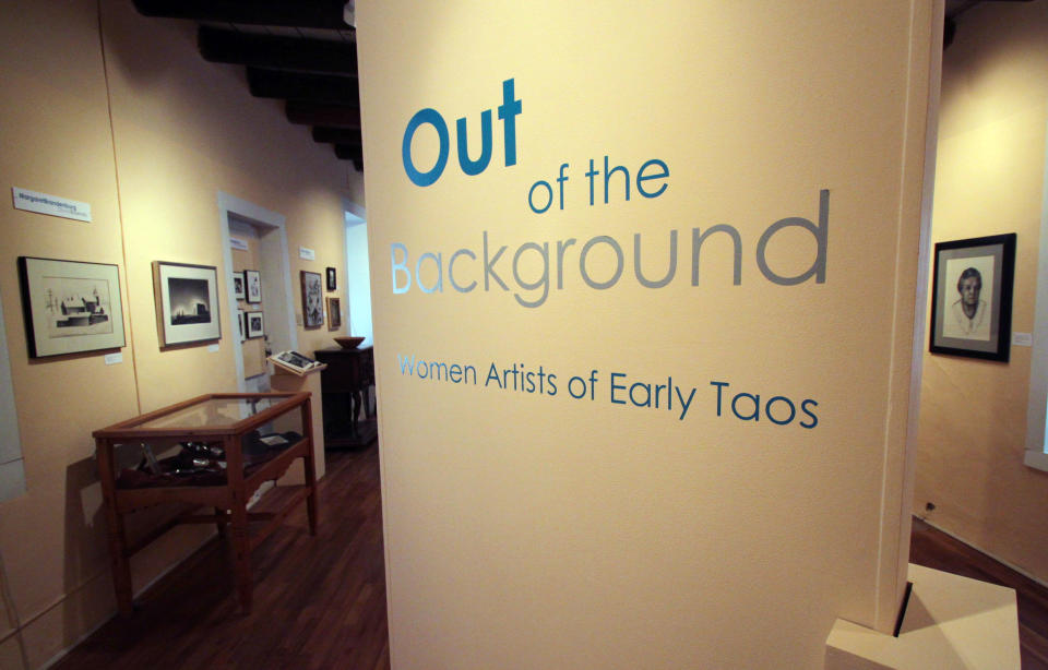 This Feb. 26, 2012 image shows the "Out of the Background" exhibition at the E.L. Blumenschein Home and Museum in Taos, N.M. The exhibition is part of a yearlong celebration aimed at recognizing Taos' remarkable women through art exhibits, film screenings, lectures, tours and outdoor excursions. (AP Photo/Susan Montoya Bryan)