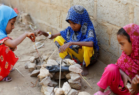 Afaf Hussein (C), 10, who is malnourished, plays with other girls near her family's house in the village of al-Jaraib, in the northwestern province of Hajjah, Yemen, February 20, 2019. REUTERS/Khaled Abdullah