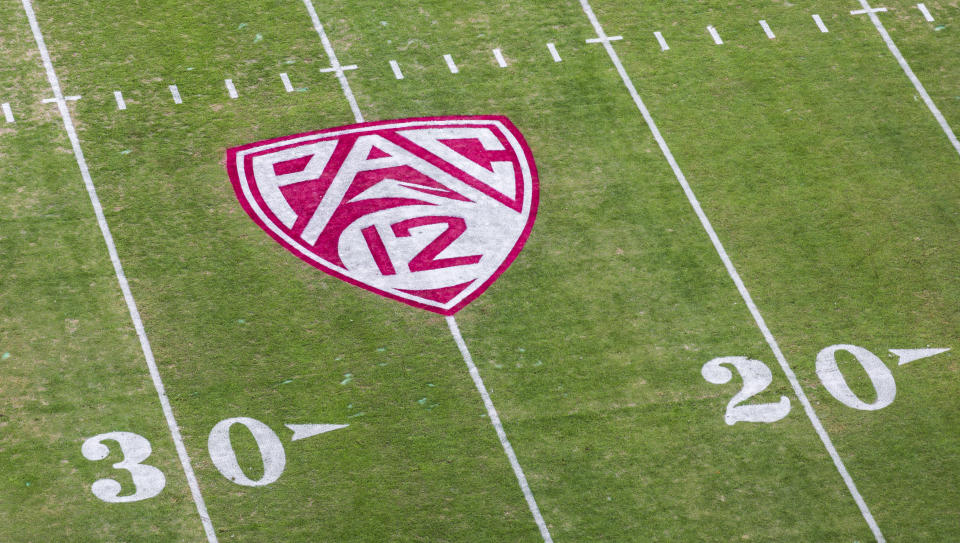 PALO ALTO, CA - NOVEMBER 27:  A high angle detail view of the PAC 12 logo on the field at Stanford Stadium before an NCAA football game between the Notre Dame Fighting Irish and the Stanford Cardinal on November 27, 2021 in Palo Alto, California.  (Photo by David Madison/Getty Images)