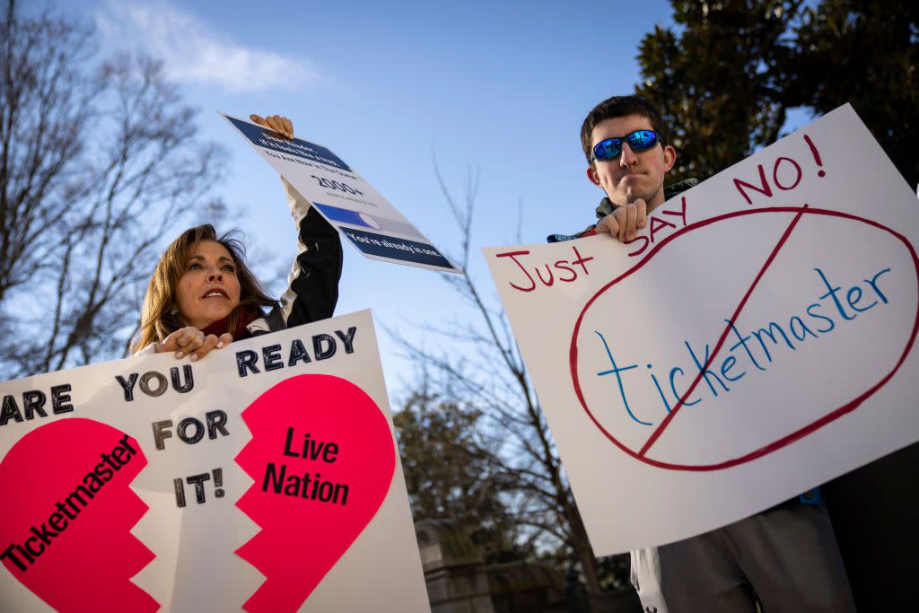 Penny Harrison and her son Parker Harrison rally against the live entertainment ticket industry outside the U.S. Capitol January 24, 2023 in Washington, DC.