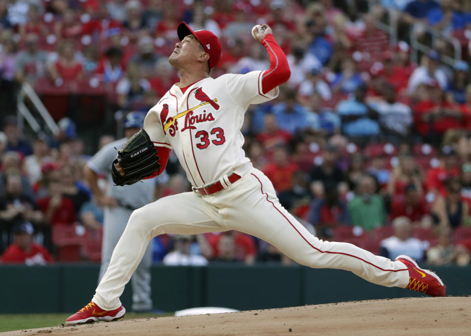 St. Louis Cardinals starting pitcher Kwang Hyun Kim (33) throws during the first inning of the team's baseball game against the Kansas City Royals, Saturday, Aug. 7, 2021, in St. Louis. (AP Photo/Tom Gannam)