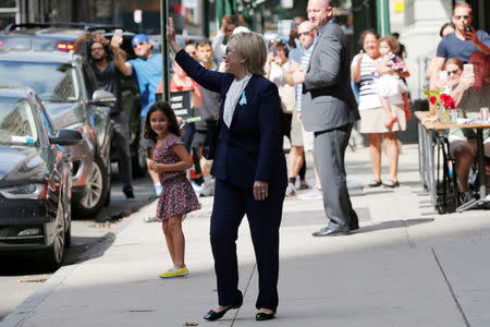 U.S. Democratic presidential candidate Hillary Clinton leaves her daughter Chelsea's home in New York, New York, United States September 11, 2016, after Clinton left ceremonies commemorating the 15th anniversary of the September 11 attacks feeling "overheated." REUTERS/Brian Snyder