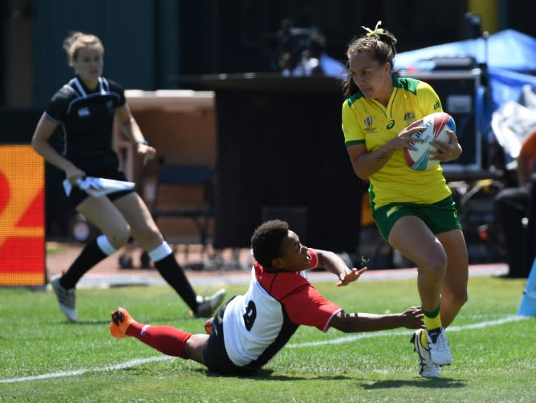 Evania Pelite of Australia scores a try in a 34-5 win over Papua New Guinea, during their women's round of 16 games at the Rugby Sevens World Cup in San Francisco