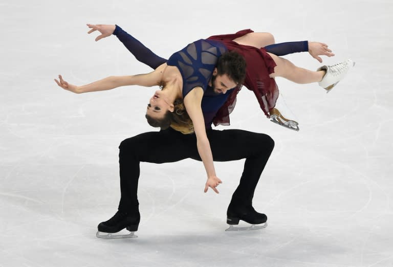 Gabriella Papadakis (Top) and Guillaume Cizeron (Bottom) of France compete during ice dance / free dance event during the European Figure Skating Championship in Bratislava on January 30, 2016