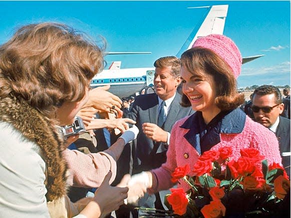 President John F. Kennedy had asked wife Jacqueline to wear her pink suit during their trip to Dallas, where he was assassinated Nov. 22, 1963