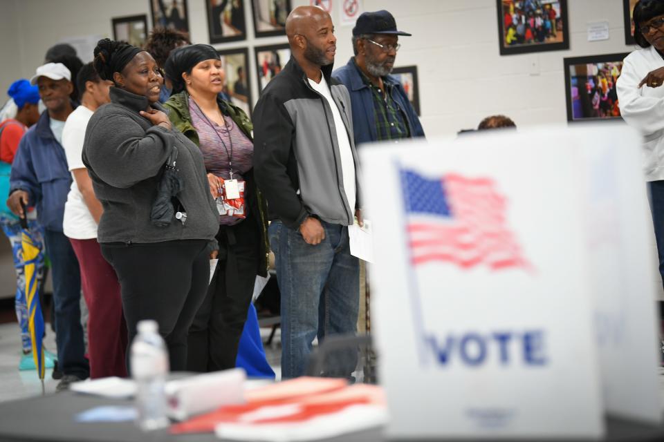 Voters wait in line to vote at Pittman Park Recreation center in Atlanta on Nov. 6, 2018, where some voters waited 3-4 hours due to only having three voting machines at the voting location.