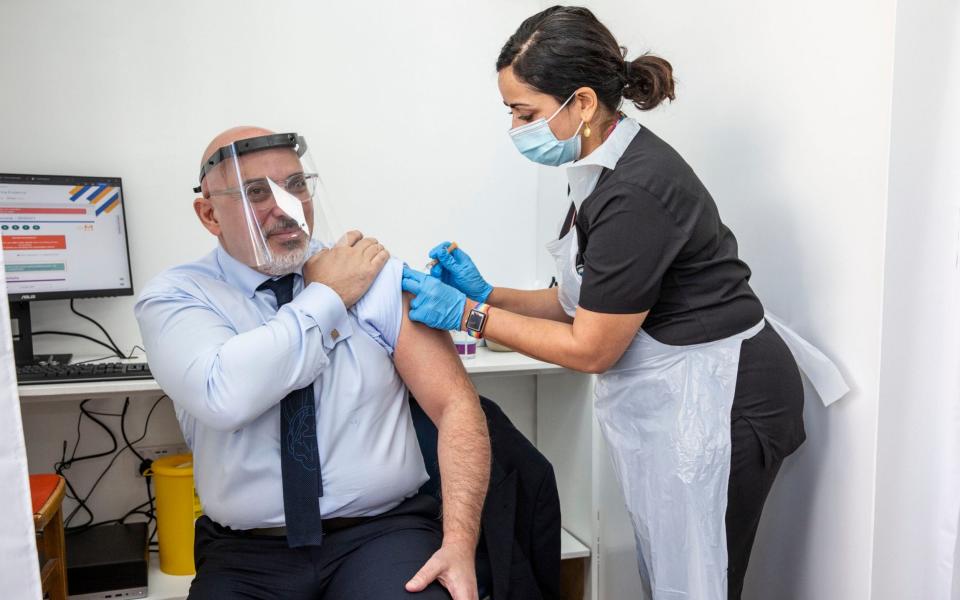 Nadhim Zahawi getting his vaccination jab by Nikki Kanani in Lewisham - Jeff Gilbert