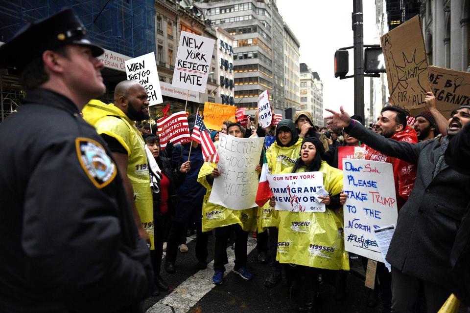 Anti-Trump protesters gather as Electoral College votes