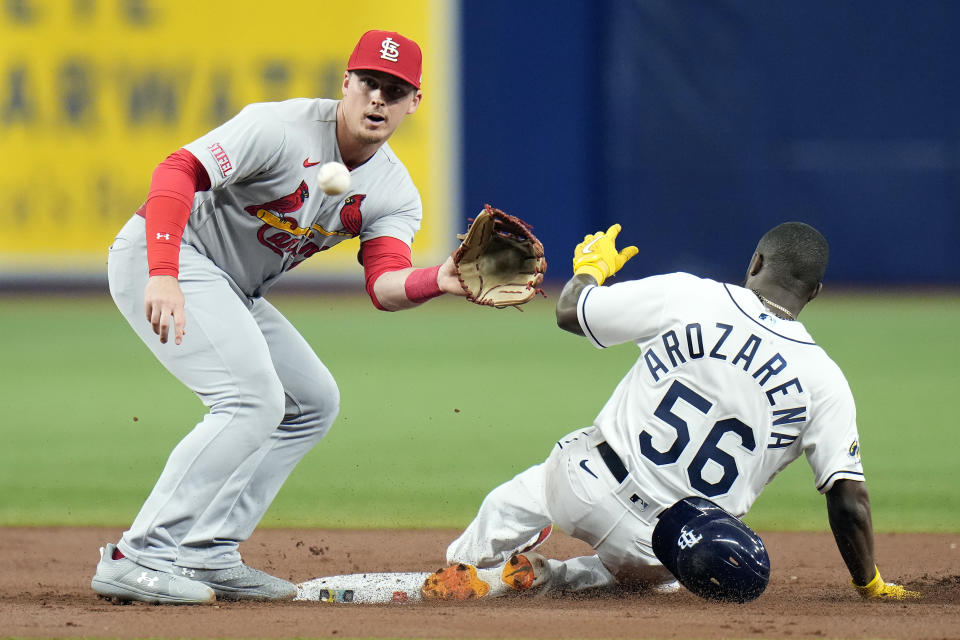 Tampa Bay Rays' Randy Arozarena (56) steals second base ahead of the throw to St. Louis Cardinals second baseman Nolan Gorman during the first inning of a baseball game Thursday, Aug. 10, 2023, in St. Petersburg, Fla. (AP Photo/Chris O'Meara)