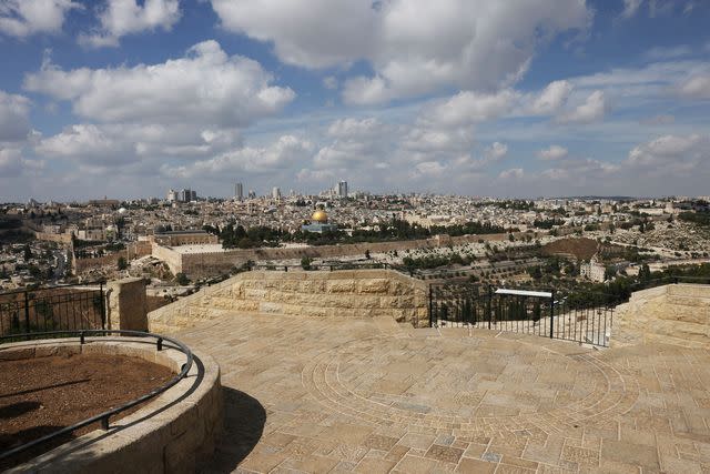 <p>AHMAD GHARABLI/Getty Images</p> The empty Mount of Olives touristic site taken on October 11, 2023 overlooking Jerusalem's Dome of the Rock (background), as the ferocious war between Israel and the Palestinian Hamas movement further south enters its fifth day.