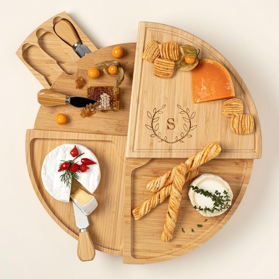 23) Uncommon Goods Personalized Compact Swivel Cheese Board