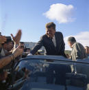 <p>Sen. John F. Kennedy greets a roadside crowd while campaigning in Indiana on Oct. 5, 1960. (Photo: Sven Walnum/Sven Walnum Photograph Collection/John F. Kennedy Presidential Library and Museum) </p>