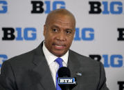 FILE - In this June 4, 2019, file photo, Minnesota Vikings chief operating officer Kevin Warren talks to reporters after being named Big Ten Conference Commissioner during a news conference in Rosemont, Ill. After the Power Five conference commissioners met Sunday, Aug. 9, 2020, to discuss mounting concern about whether a college football season can be played in a pandemic, players took to social media to urge leaders to let them play.(AP Photo/Charles Rex Arbogast, File)