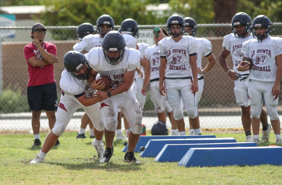 The La Quinta High School Blackhawks practice for the upcoming 2023 season Tuesday morning in La Quinta, Calif., August 8, 2023. 