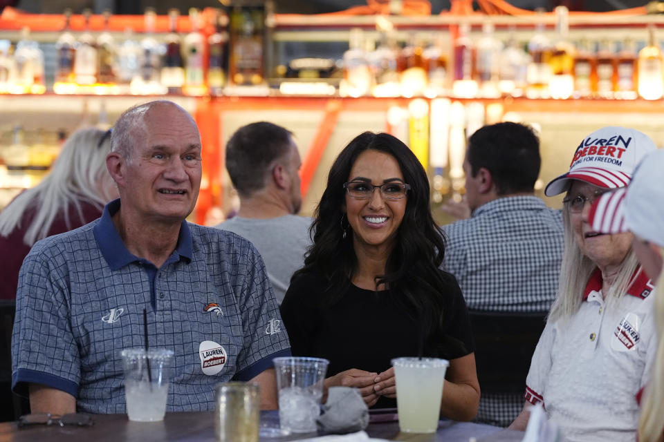 Republican congresswoman Lauren Boebert, center, greets supporters during a primary election watch party, Tuesday, June 25, 2024, in Windsor, Colo. (AP Photo/David Zalubowski)