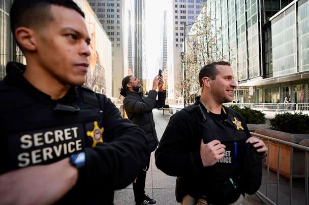 PHOTO: Members of the United States Secret Service stand outside Trump Tower, Monday, April 3, 2023, in New York. (Bryan Woolston/AP)