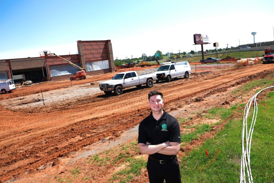Joseph Julian, eExpress Marketing and Brand Ambassador, is shown at the northwest corner of NW 27 and Interstate 35 in Moore where a new travel stop is under construction.