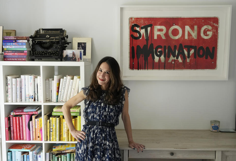 Author Allison Winn Scotch poses for a portrait in her home office, Monday, Feb. 26, 2024, in Los Angeles. (AP Photo/Chris Pizzello)