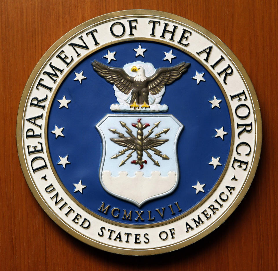 FILE - This Friday, Aug. 10, 2007, file photo, shows the logo of the Department of the U.S. Air Force at the United Staes embassy, in Berlin. A new report issued Monday, Dec. 21, 2020, on racial disparities in the Air Force concludes that Black service members in the service are far more likely to be investigated, arrested, face disciplinary actions, and be discharged for misconduct. (AP Photo/Michael Sohn, File)