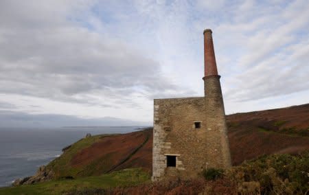 FILE PHOTO: The remains of the engine house at the Wheal Prosper copper and tin mine is seen along the Cornish coastline near Porthleven in Cornwall, Britain October 26, 2017.  REUTERS/Toby Melville/File Photo