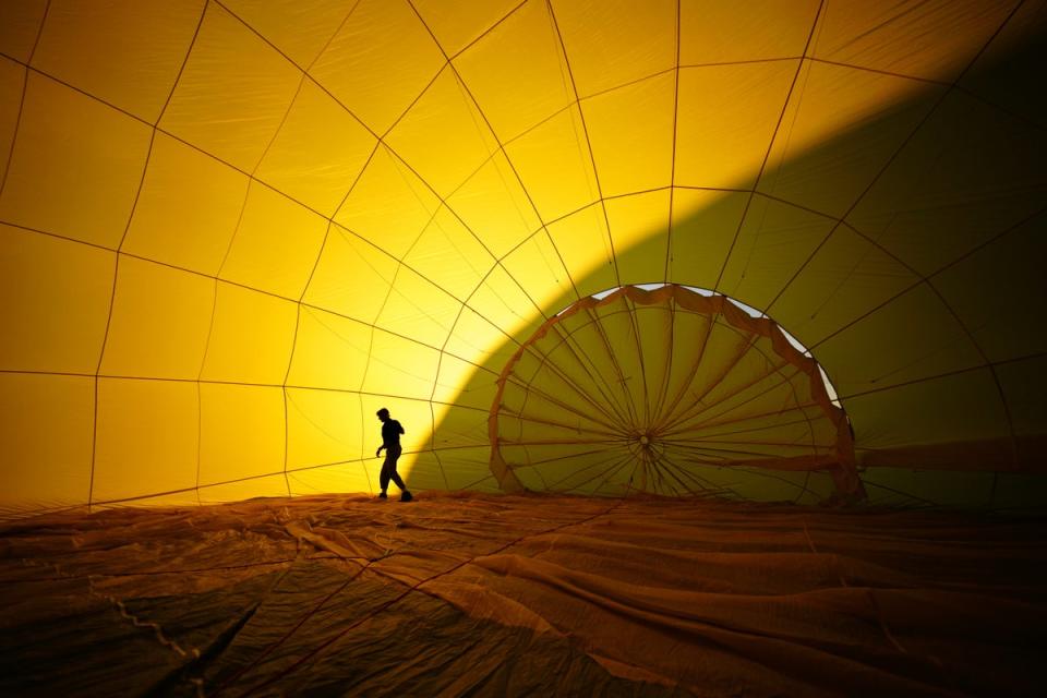 A balloon is prepared for flying at Ashton Court, Bristol (Ben Birchall/PA) (PA Wire)