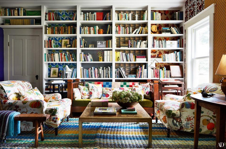 Club chairs wear a Josef Frank print in the study. Max Kuehne cocktail table; custom recycled rope rug by RP Miller.