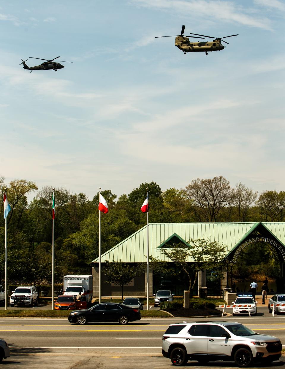 United States Army Chinook and Black Hawks conduct a fly over of McGregor Park presenting an aerial salute in honor of the nine soldiers who died in a Black Hawk training exercise outside of Fort Campbell in Clarksville, Tenn. on Apr 13, 2023. 