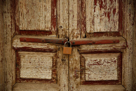 The locked door of a neighbourhood mosque is seen in Kashgar, Xinjiang Uighur Autonomous Region, China, March 23, 2017. REUTERS/Thomas Peter