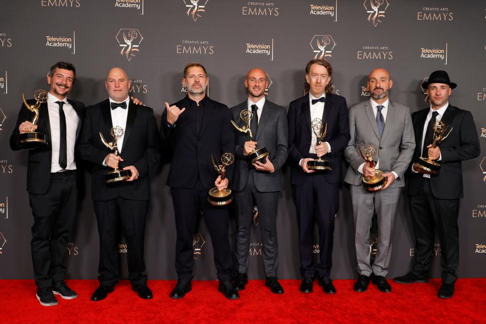 Chris Smith (third from right) collects his first Emmy Jan. 7, 2024, as part of the team (from left, Antoine Chicoye, Mikey Corker, Vincent Kardasik, Alexandre Lesbats, Laurent Pujol, Michael Darrigade) winning for best cinematography for a nonfiction program for "100 Foot Wave."