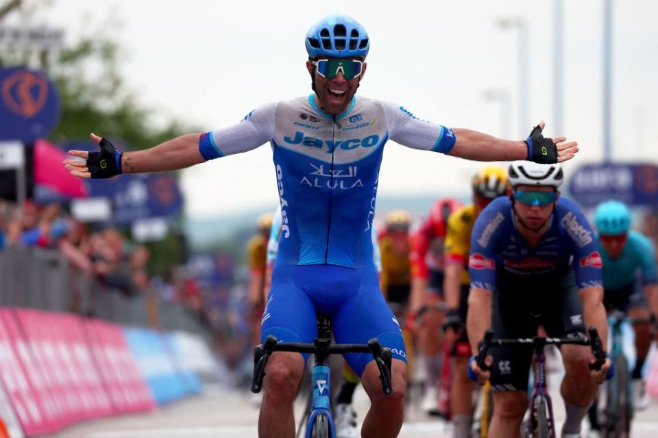 Team Jayco AlUlas Australian rider Michael Matthews celebrates as he crosses the finish line to win the third stage of the Giro dItalia 2023 cycling race 216 km between Vasto and Melfi on May 8 2023 Photo by Luca BETTINI  AFP Photo by LUCA BETTINIAFP via Getty Images