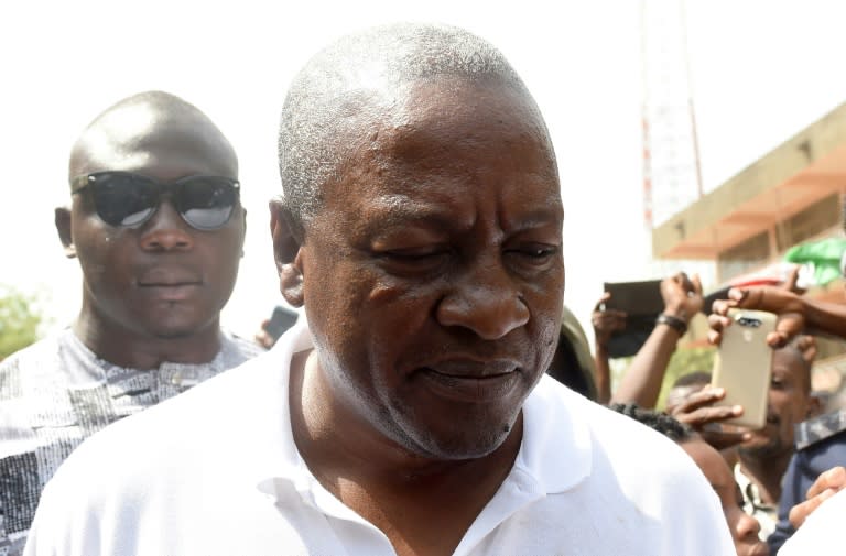 President and candidate of Ghana's ruling National Democratic Congress party John Mahama leaves after voting in the Bole district, northern region, on December 7, 2016