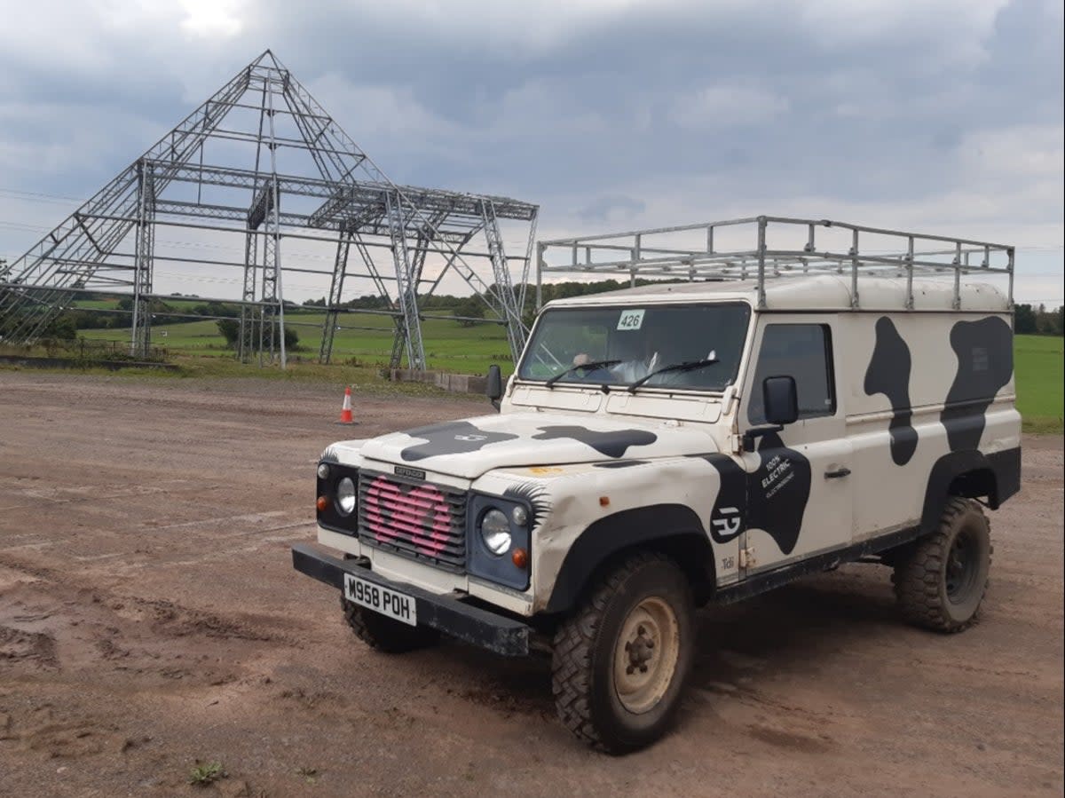 An old Land Rover Defender which is now a fully electric vehicle, at the Worthy Farm Glastonbury Festival site (Cardiff University/Electrogenic)