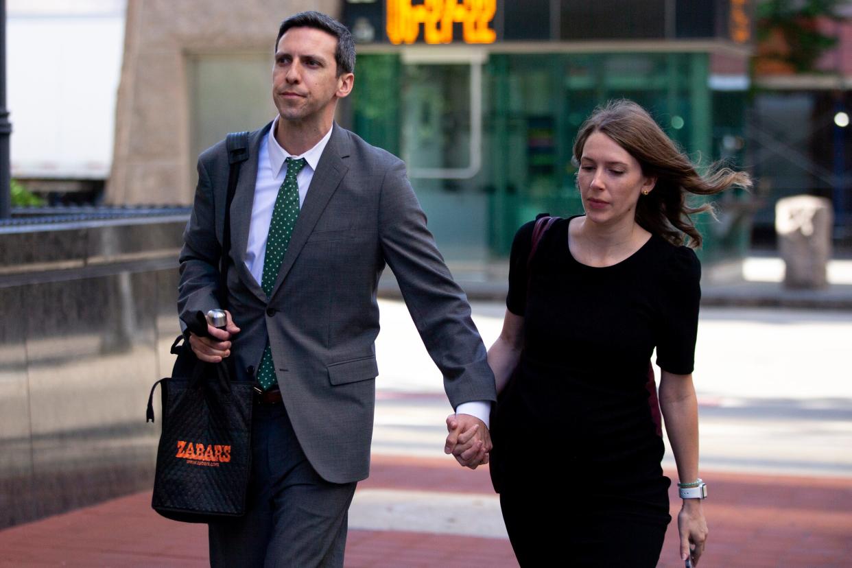 Former Cincinnati City Councilman P.G. Sittenfeld and his wife, Dr. Sarah Coyne, arrive for his federal public corruption trial at the Potter Stewart U.S. Courthouse in Cincinnati on Monday, June 27, 2022. 