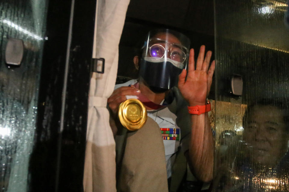 Philippine Olympic gold medallist Hidilyn Diaz gestures as she arrives at the Ninoy Aquino International Airport in Manila on July 28, 2021, following her return to her home country after she won gold in the women's 55kg weightlifting at the Tokyo 2020 Olympics. (Photo by JAM STA ROSA / AFP) (Photo by JAM STA ROSA/AFP via Getty Images)