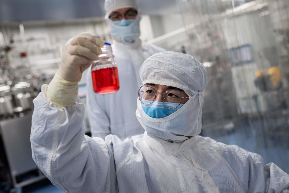 Scientists work on Covid-19 vaccine at Sinovac Biotech facilities in BeijingAFP via Getty Images