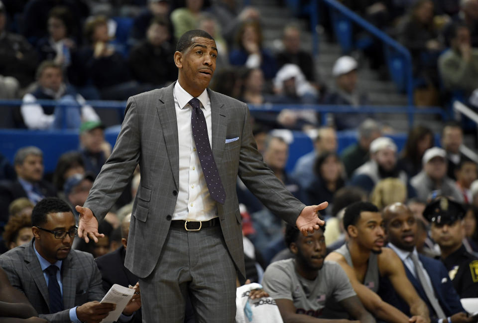 Connecticut head coach Kevin Ollie gestures during the first half of an NCAA college basketball game, Saturday, Jan. 20, 2018, in Hartford, Conn. (AP Photo/Jessica Hill)