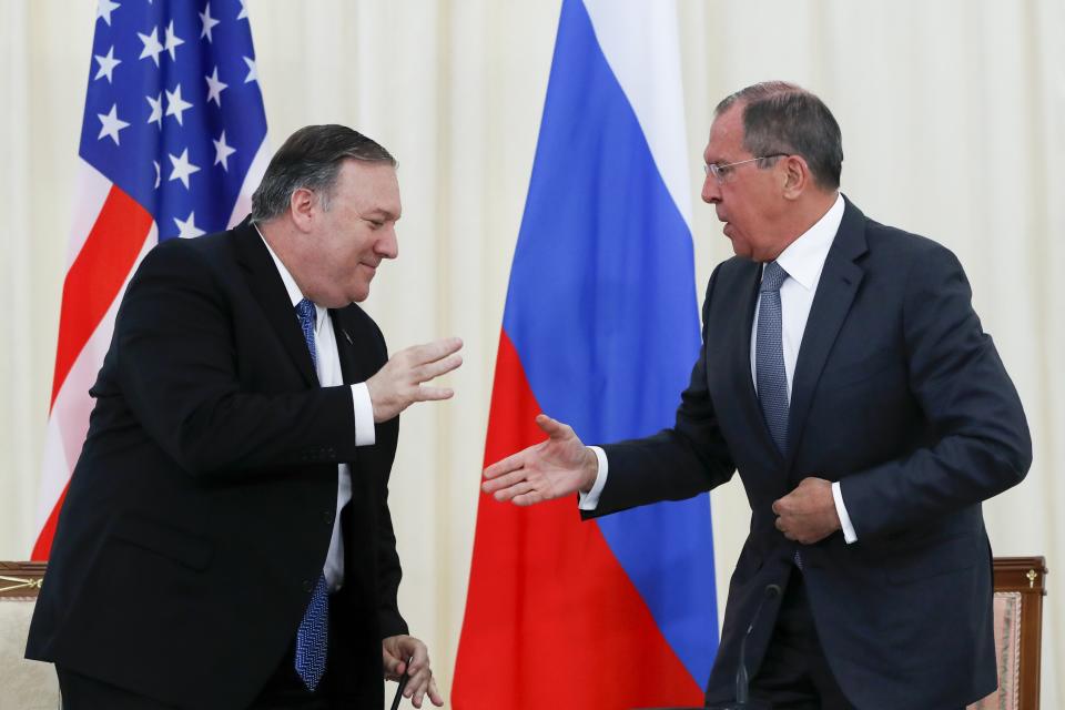 U.S. Secretary of State Mike Pompeo, left, and Russian Foreign Minister Sergey Lavrov shake hands after their joint news conference following the talks in the Black Sea resort city of Sochi, southern Russia, Tuesday, May 14, 2019. Pompeo's first trip to Russia starts Tuesday in Sochi, where he and Russian Foreign Minister Sergey Lavrov are sitting down for talks and then having a joint meeting with President Vladimir Putin. (AP Photo/Pavel Golovkin, Pool)