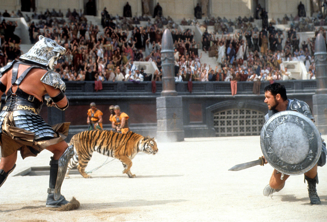 Russell Crowe facing off against tiger in a scene from the film 'Gladiator', 2000. (Photo by Universal/Getty Images)