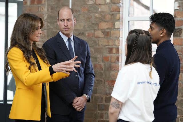 <p>Kirsty Wigglesworth-WPA Pool/Getty Images</p> Princess Kate and Prince William chatting to young people in Birmingham