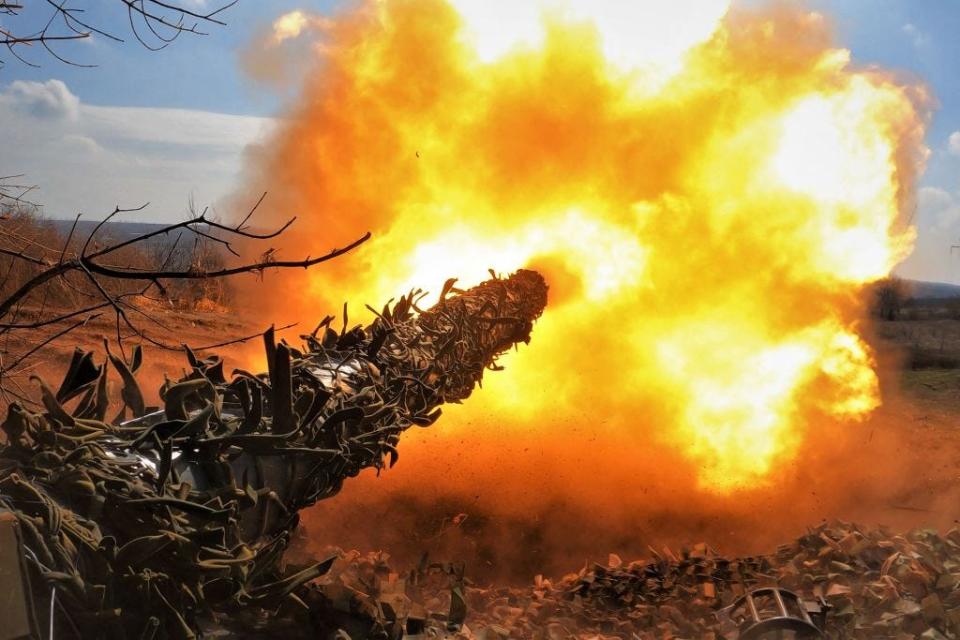 This still image taken from an AFP video on March 26, 2023, shows a Ukrainian T-72 tank fires at Russian positions on the front line near Bakhmut, amid the Russian invasion of Ukraine.