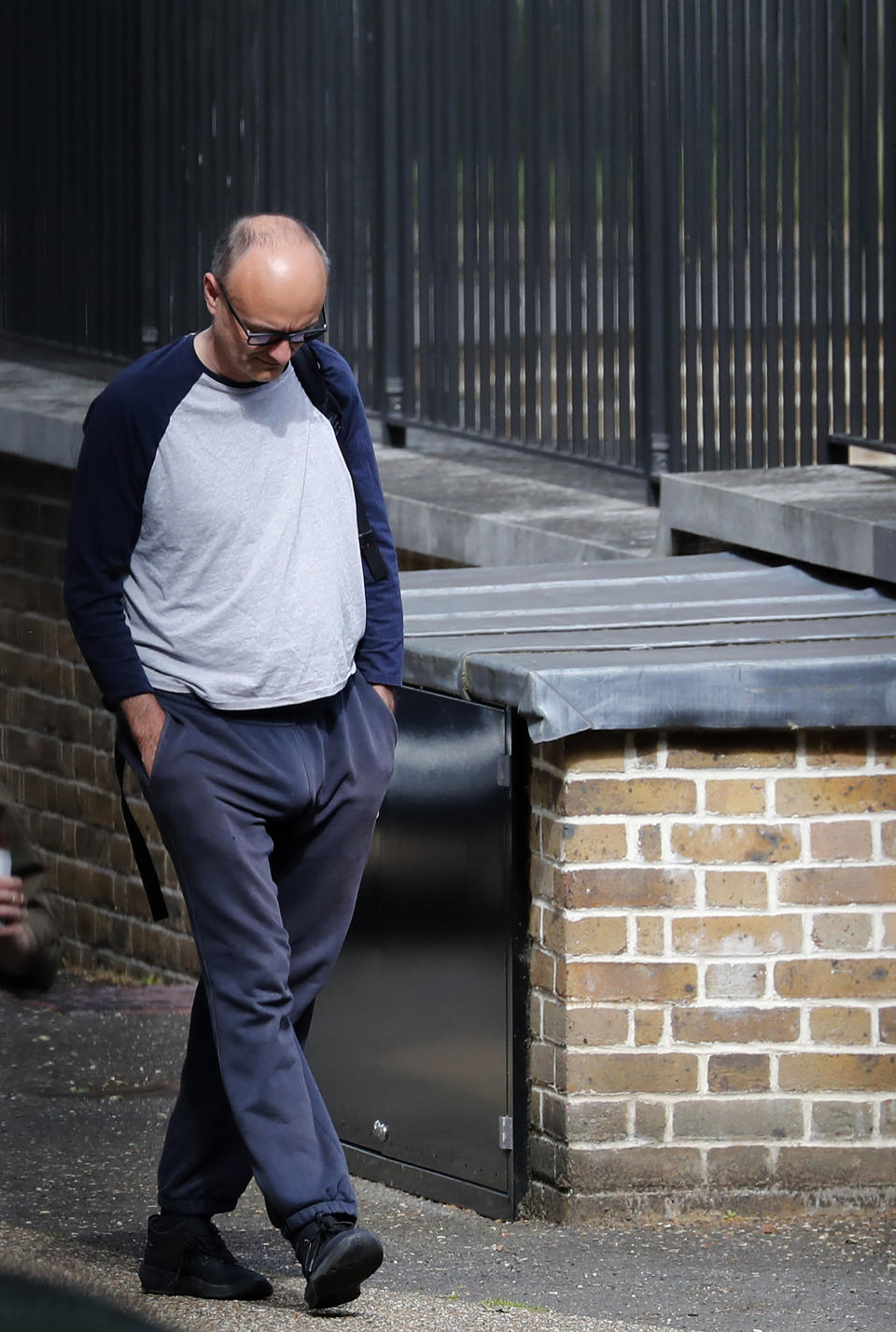 Dominic Cummings, the top aide to Britain's Prime Minister Boris Johnson, arrives at Downing Street the day after he gave a press conference over allegations he breached coronavirus lockdown restrictions in London, Tuesday, May 26, 2020. (AP Photo/Frank Augstein)