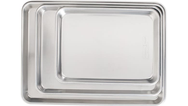 Three aluminum pans