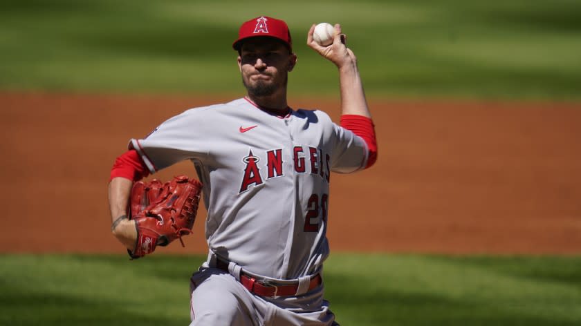 Los Angeles Angels starting pitcher Andrew Heaney (28) in the first inning of a baseball game Sunday, Sept. 13, 2020, in Denver. (AP Photo/David Zalubowski)